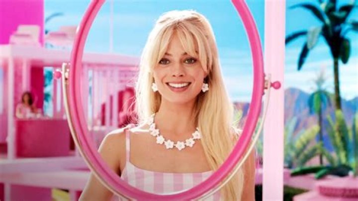 Barbie: Barbie looking into her dream house mirror&nbsp;