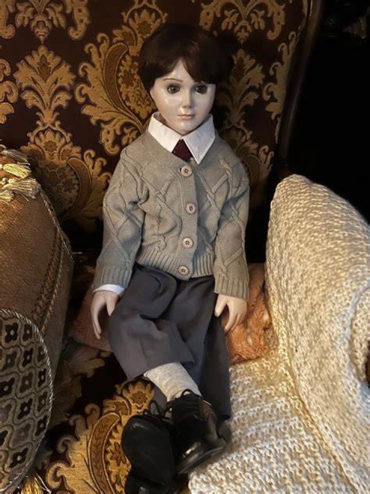 Brahms the doll opening his mouth with black coming out in Brahms: The Boy II