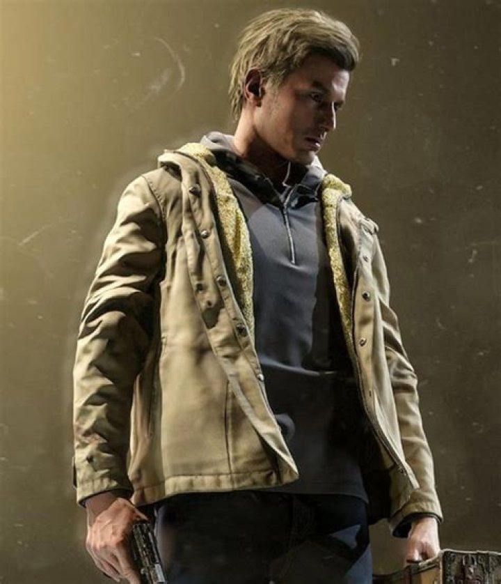 Ethan Winters in a Resident Evil 8 promotional image.