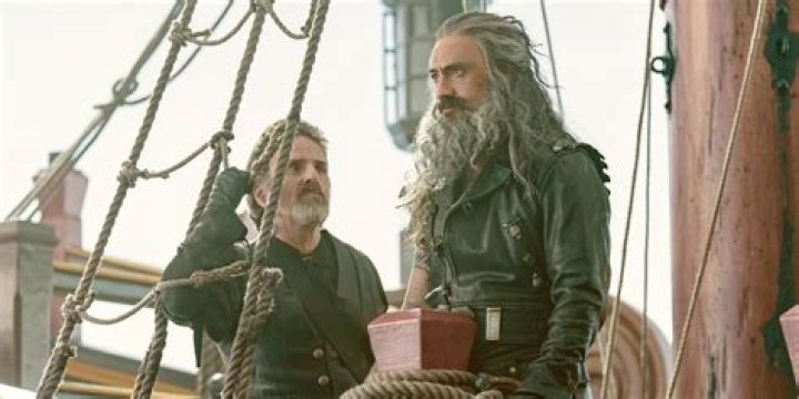 Izzy Hands and Blackbeard's crew on the beach in Our Flag Means Death.