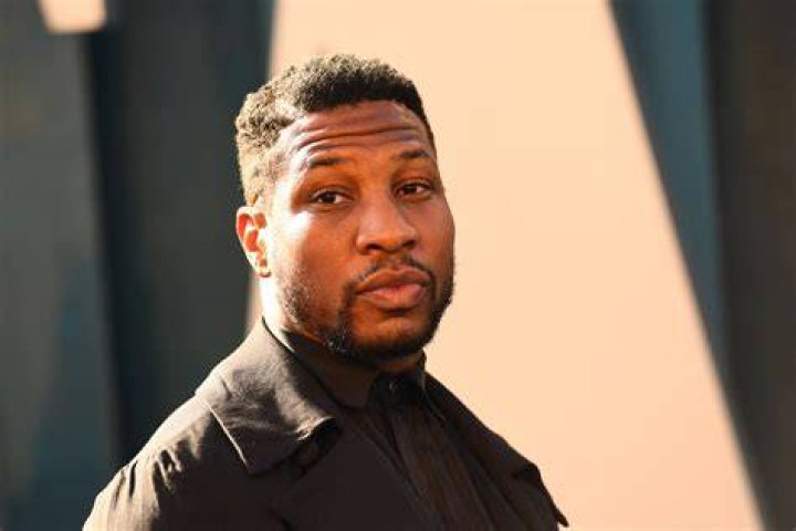 Jonathan Majors on Plane in Devotion