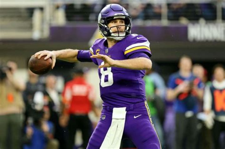 Kirk Cousins rears back to throw
