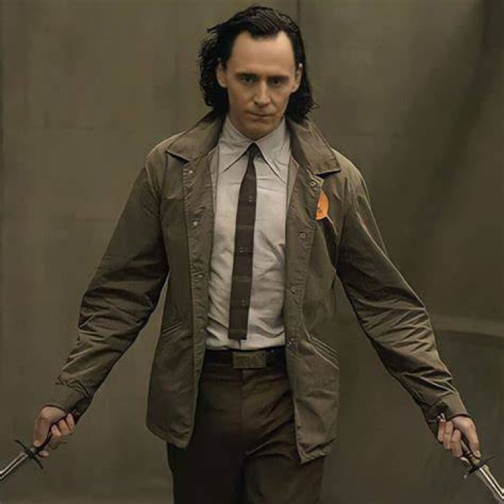 Loki in TVA jacket and tie in Loki season 1