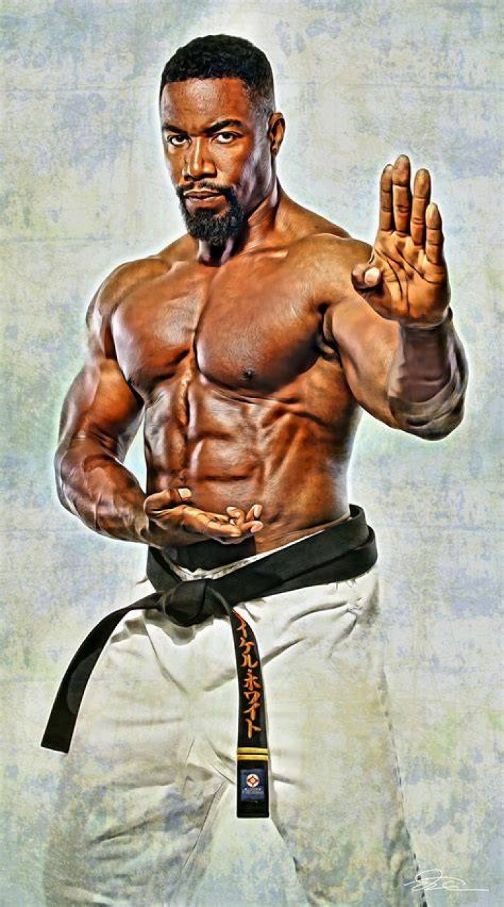 Michael Jai White with two guns in Black Dynamite