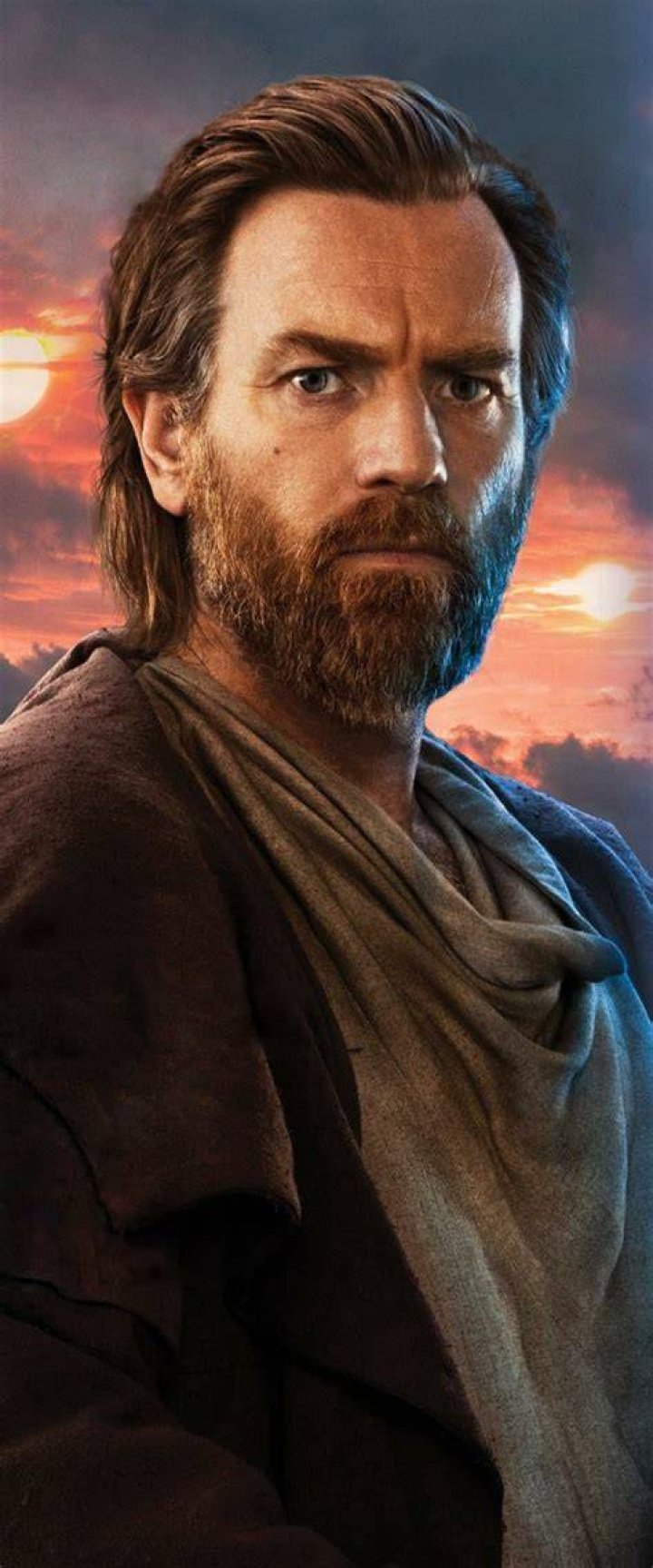 Obi-Wan Kenobi (Ewan Mcregor) as he appeared in Star Wars Episode I The Phantom Menace holding his blue lightsaber