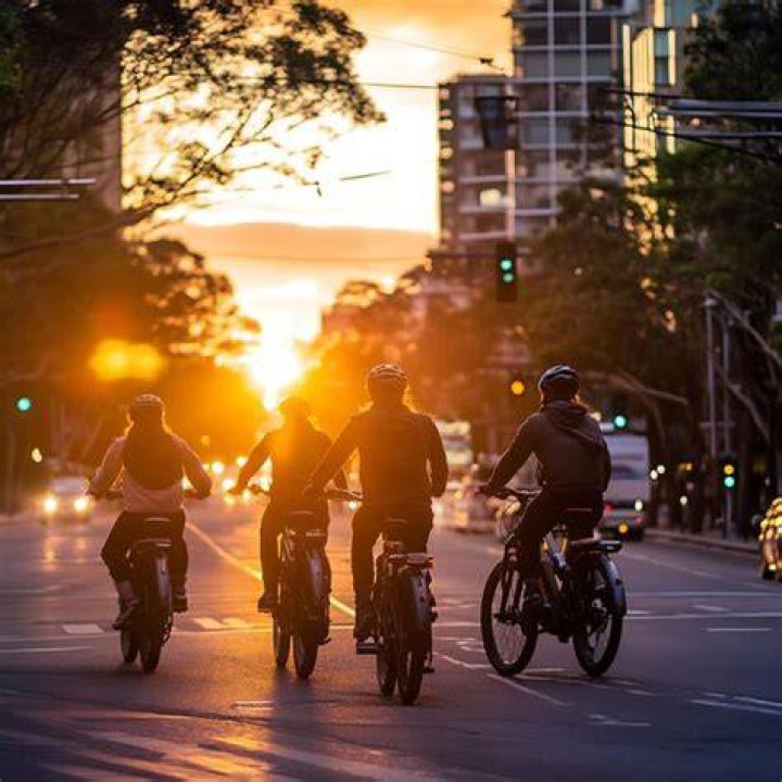 people riding bikes at sunset in thailand