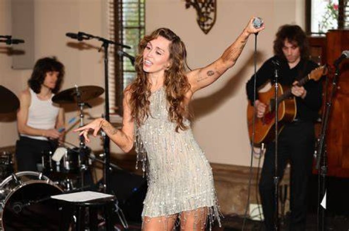 Performers such as Miley Cyrus have started covering their body in inked designs. Photo / Getty Images