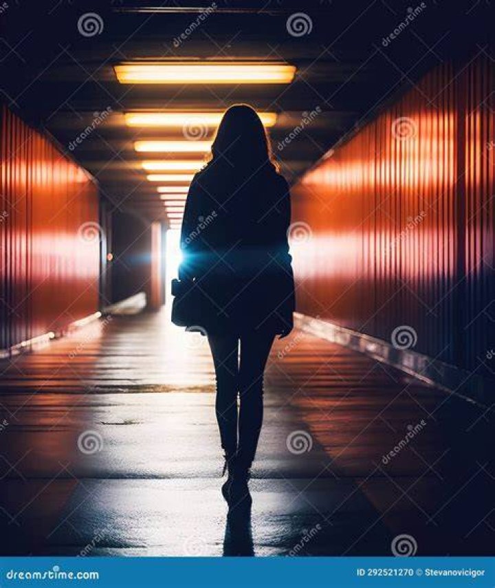 person walking through Passage des Panoramas, Paris, France
