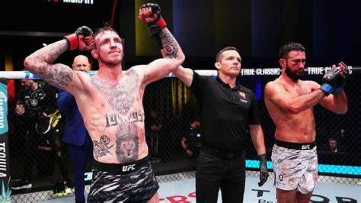 Rhys McKee puts his hands up for a UFC fight