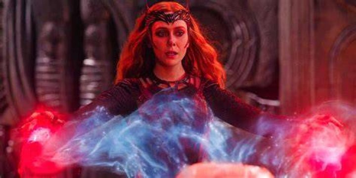 Scarlet Witch using magic to read the Darkhold in WandaVision