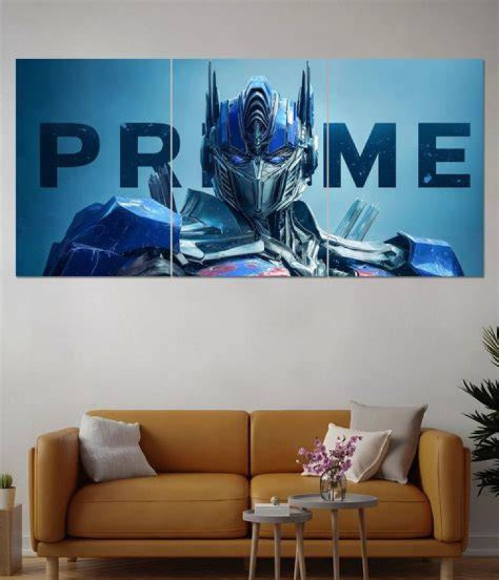 Split image of Optimus Prime from Transformers 2007 movie and 1986 animated movie.
