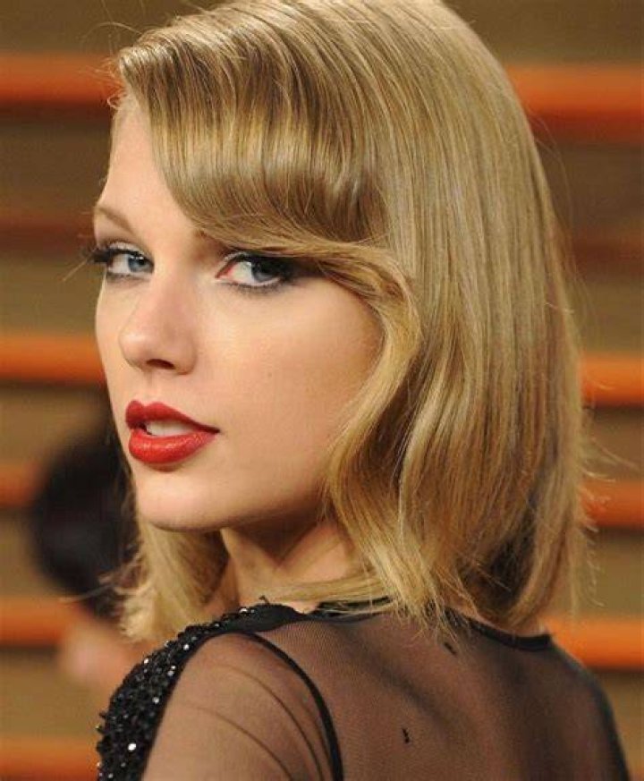 Taylor Swift looking over shoulder