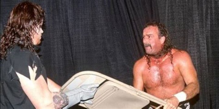 The Undertaker Stops Jake "the Snake"