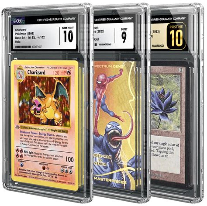 Three different graded Pokemon cards above a sticker of Ash thinking on a gold background