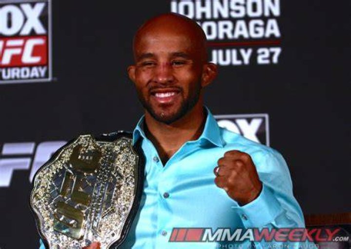 UFC 174 results Demetrious Johnson decisions Ali Bagautinov to retain